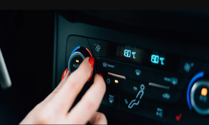 Hand Turning Heating and Cooling Knob in Car